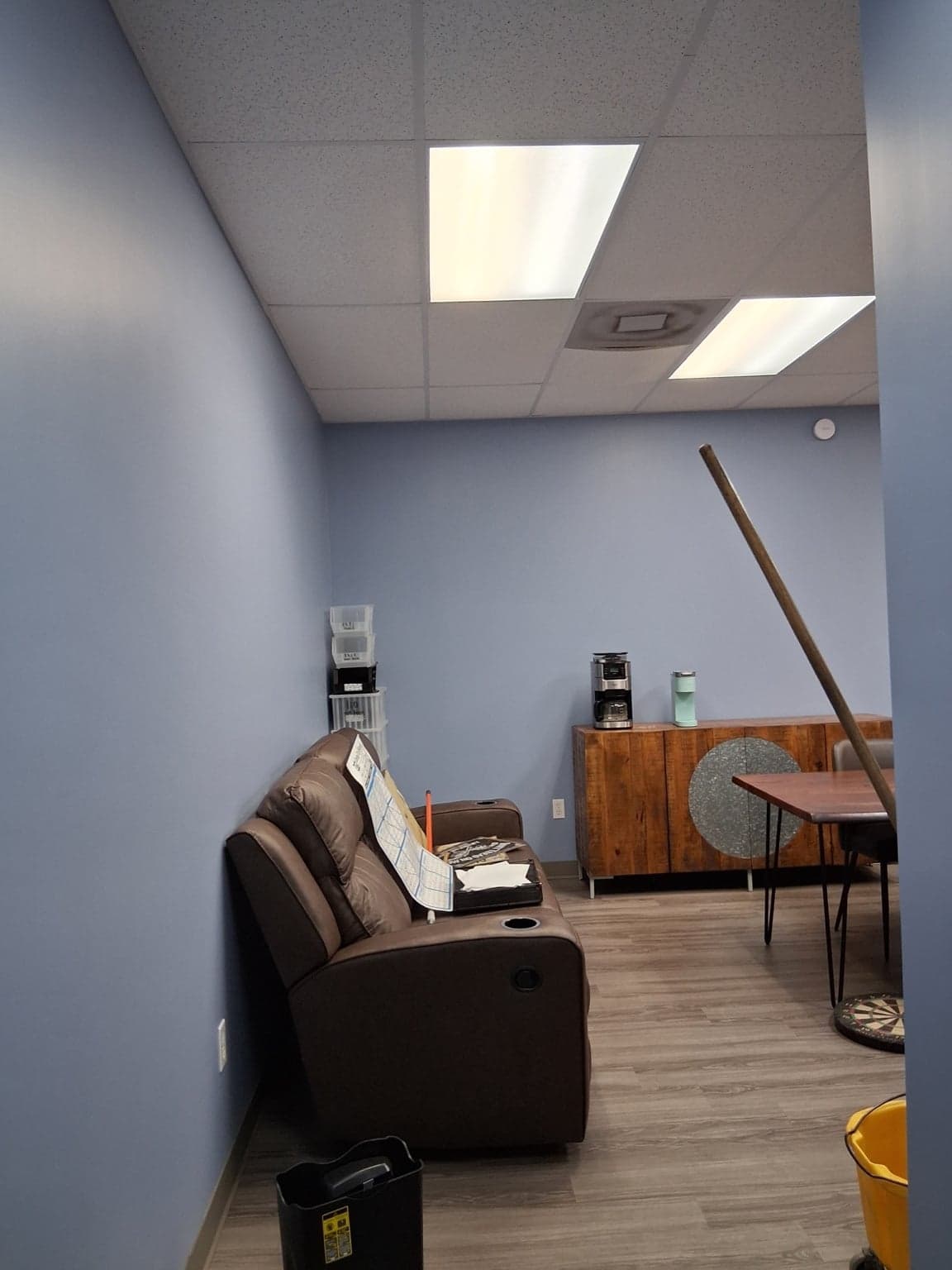 Break room with freshly painted soft-blue walls