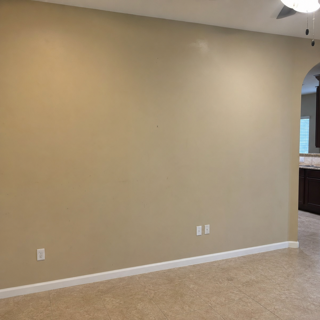 Before: plain flat builder-grade painted accent wall in a Houston home
